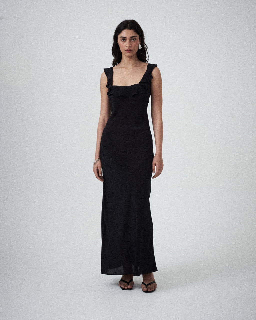 Front view of model wearing the Ariel Bias-Cut Evening Dress in Black