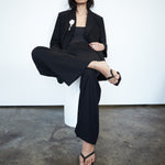 Editorial image of VARNA Erica Oversized Blazer in black — designer oversized blazer styled with quiet confidence.
