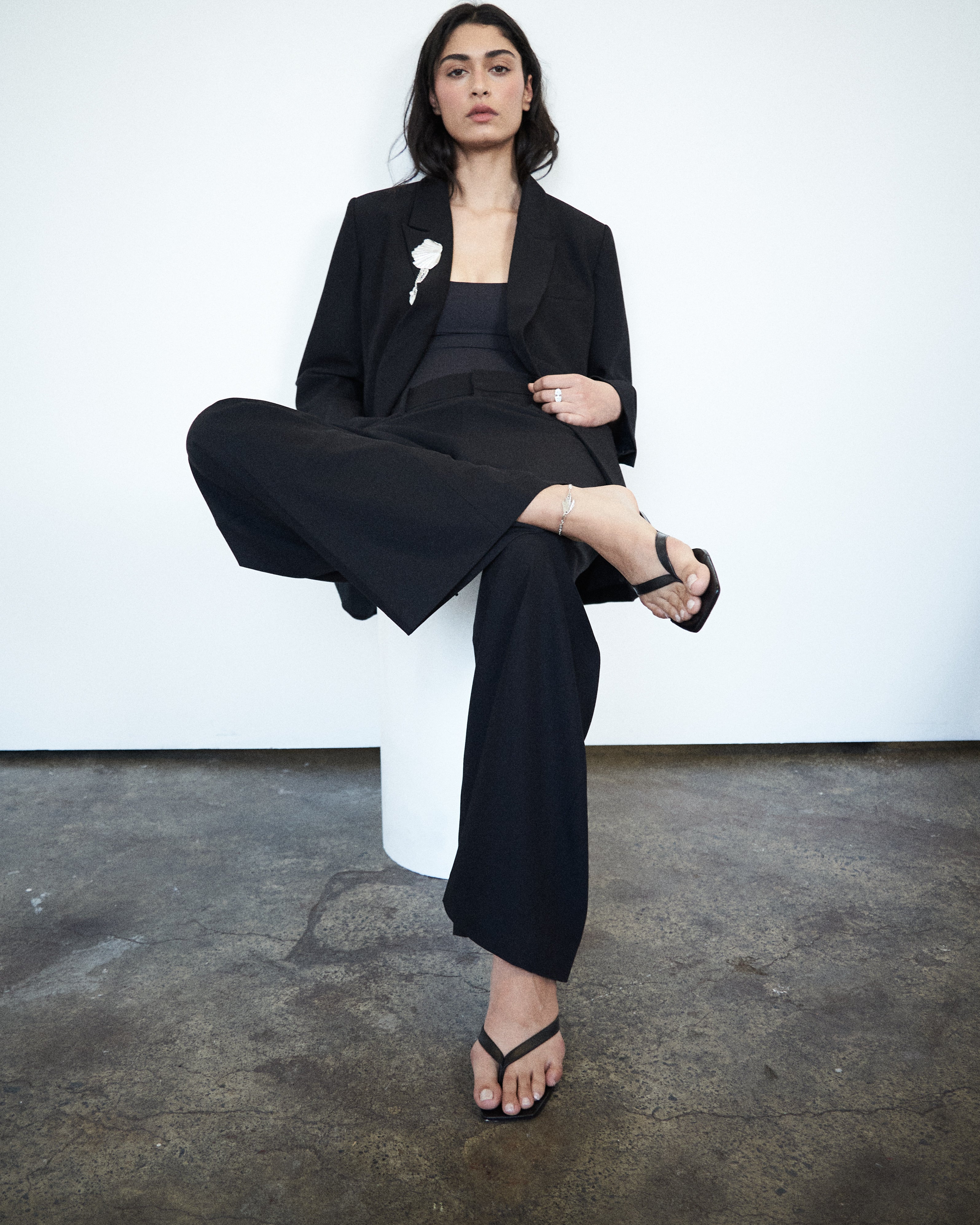 Editorial image of VARNA Erica Oversized Blazer in black — designer oversized blazer styled with quiet confidence.