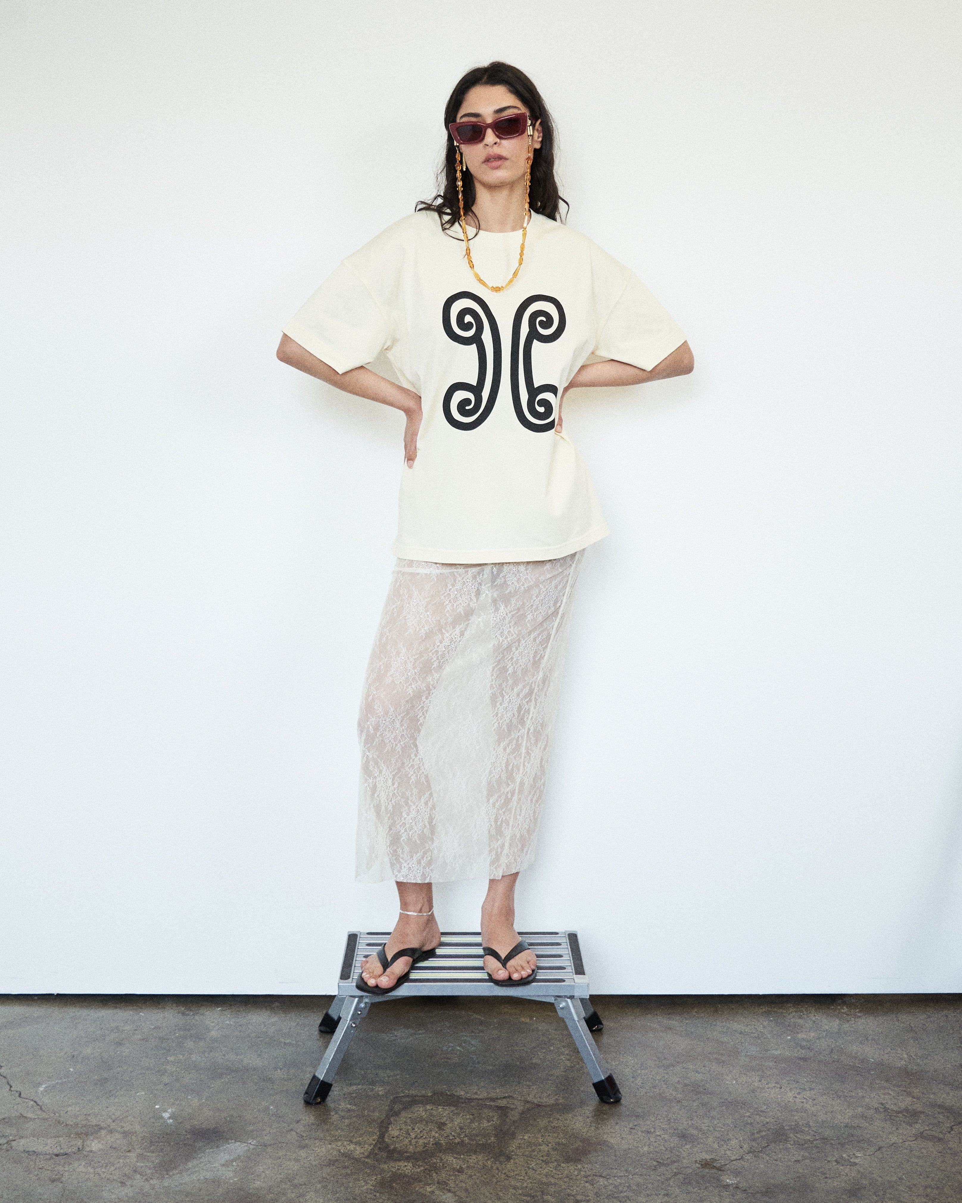 Designer white cotton graphic tee by VARNA with bold abstract motif