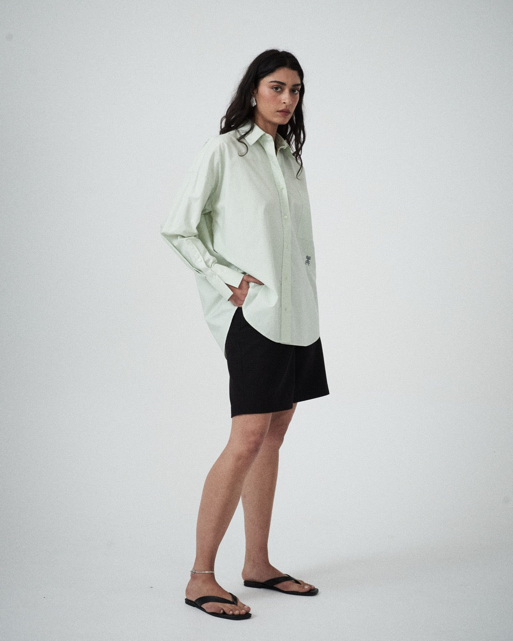 Three-quarter view of the Elara Shirt in Pistachio