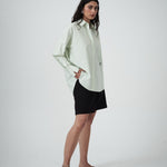 Three-quarter view of the Elara Shirt in Pistachio