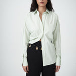 Close-up detail showing collar, cuffs, or embroidery of the Elara Shirt