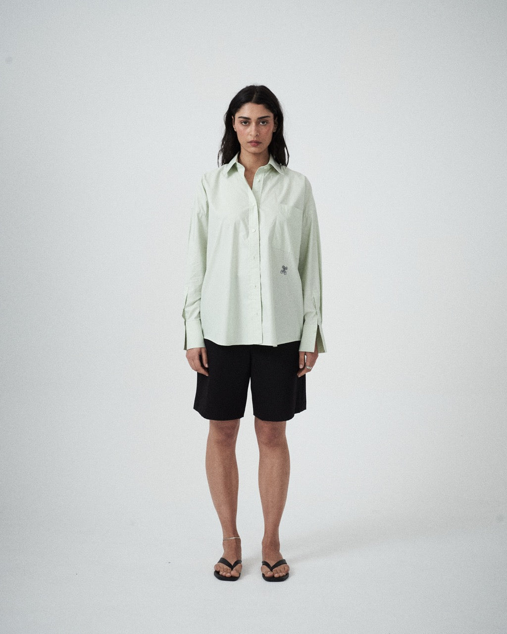 Front view of model wearing the Elara Tailored Shirt in Pistachio