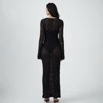 Back view of VARNA Cecil Maxi Dress in intricate black lace with slim silhouette and maxi length.