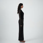 Side profile of VARNA Cecil Maxi Dress highlighting semi-sheer floral lace and elegant body-skimming fit.