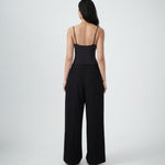 Back view of VARNA Enrica Relaxed Tailored Pant in black with straight leg and minimal tailoring.