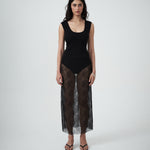 Front view of VARNA Lucienne Maxi Lace Skirt in black floral lace showing sheer finish, straight silhouette, and delicate texture.