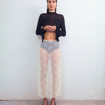 Front view of VARNA Lucienne Maxi Lace Skirt in milk — delicate floral lace texture with sheer style and straight silhouette.