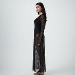Side profile of VARNA Lucienne Ruffle Lace Maxi Dress in black showing sheer lace texture and graceful drape.