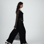 VARNA Lucienne Ruffle Lace Maxi Dress in black layered over Enrica Relaxed Tailored Pant — a modern contrast of lace and tailoring.