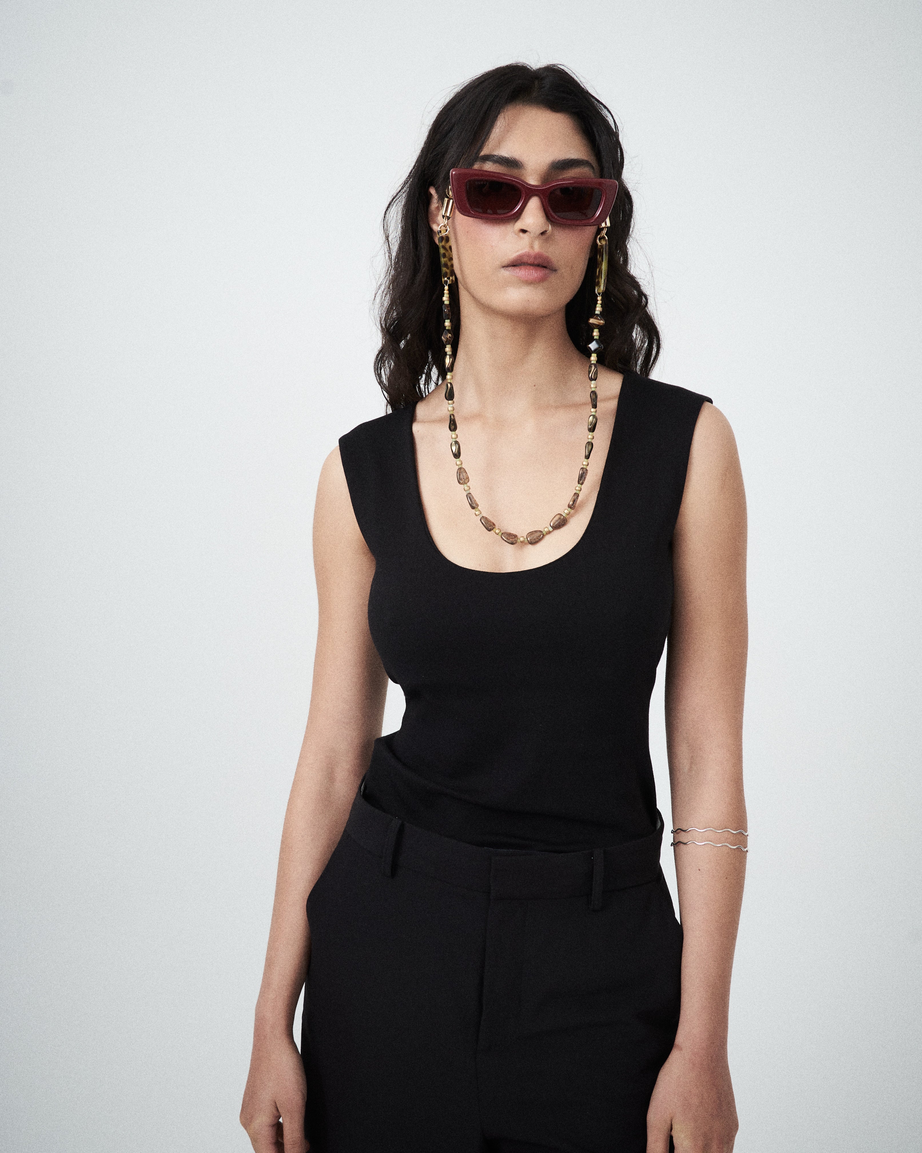 Detail shot of fabric texture on black knit top