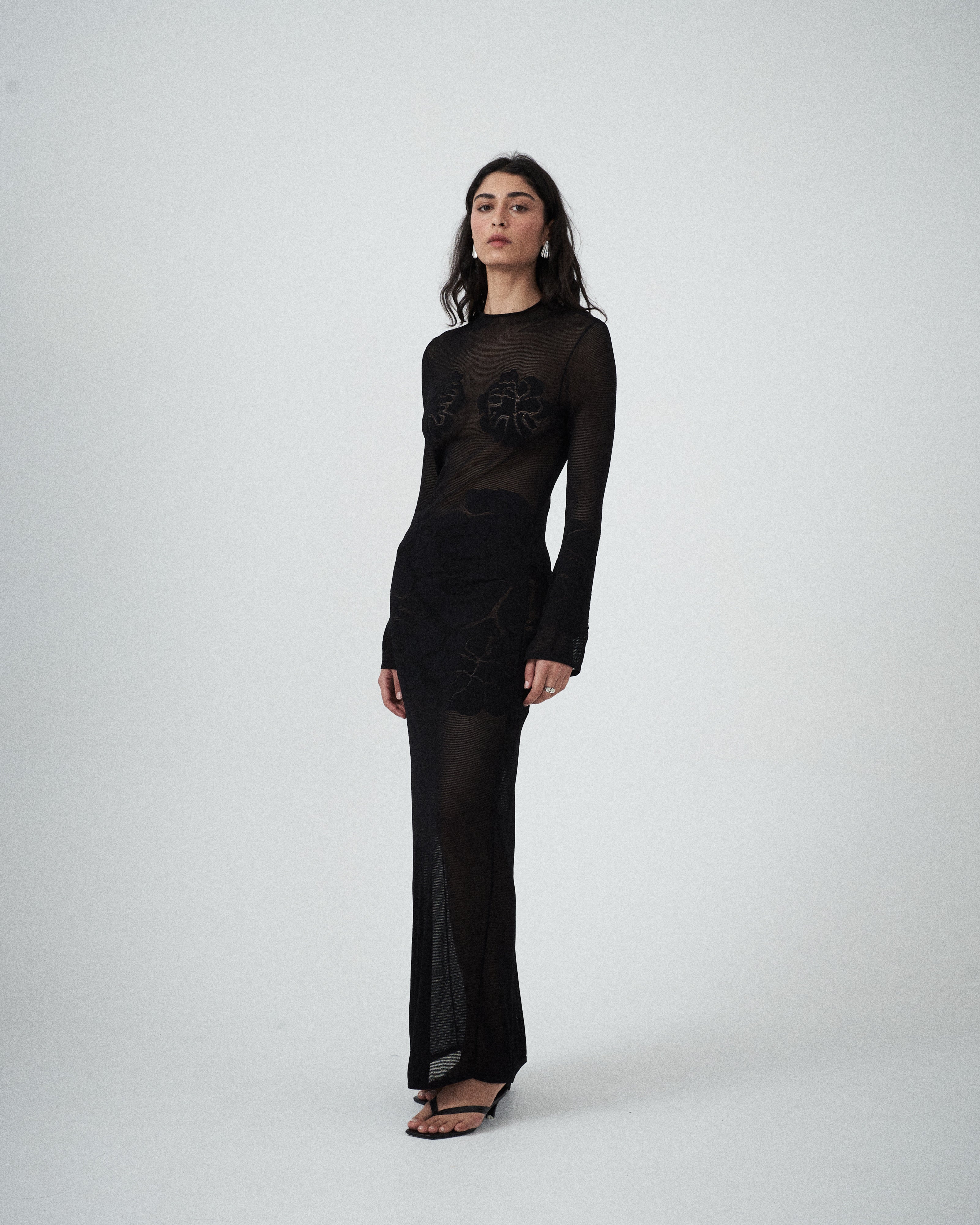 VARNA Seraphine Knit Maxi Dress in black lightweight knit with high neckline and long sleeves.