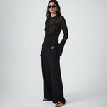 VARNA Seraphine Knit Top in black lightweight knit with high neckline and long sleeves.