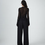 Lightweight black knit fabric of VARNA Seraphine Top with tonal floral detailing.